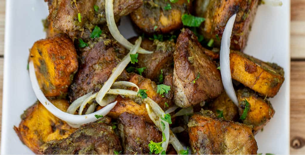 Rwandan Pork Fry ( Served with Grilled Banana or Potatoes) 